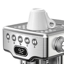Espresso machine with a white cup